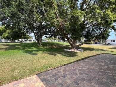 Palm Hill Country Club is a vibrant, 55+ golf and tennis on Palm Hill Golf Club in Florida - for sale on GolfHomes.com, golf home, golf lot