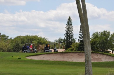Prestigious Cascades Community of Boynton Beach, bordering the on Westchester Golf and Country Club in Florida - for sale on GolfHomes.com, golf home, golf lot