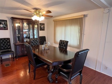Palm Hill Country Club is a vibrant, 55+ golf and tennis on Palm Hill Golf Club in Florida - for sale on GolfHomes.com, golf home, golf lot