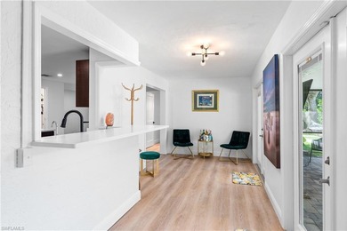 LOWEST PRICED home nestled in the middle of Country Club of on Country Club of Naples in Florida - for sale on GolfHomes.com, golf home, golf lot