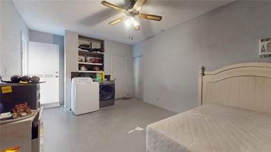 This home features a spacious layout with tile flooring on Palmetto Golf Course in Florida - for sale on GolfHomes.com, golf home, golf lot