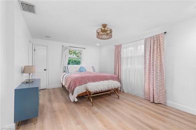 LOWEST PRICED home nestled in the middle of Country Club of on Country Club of Naples in Florida - for sale on GolfHomes.com, golf home, golf lot