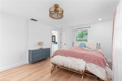 LOWEST PRICED home nestled in the middle of Country Club of on Country Club of Naples in Florida - for sale on GolfHomes.com, golf home, golf lot