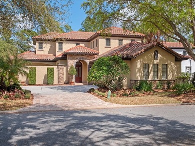 This exceptional residence is nestled within the prestigious on Lake Nona Golf Club, Inc. in Florida - for sale on GolfHomes.com, golf home, golf lot