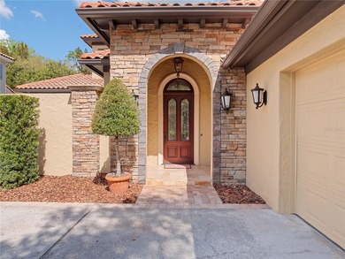 This exceptional residence is nestled within the prestigious on Lake Nona Golf Club, Inc. in Florida - for sale on GolfHomes.com, golf home, golf lot