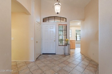 Discover this spacious home on a prime corner lot in the Augusta on Augusta Ranch Golf Club in Arizona - for sale on GolfHomes.com, golf home, golf lot