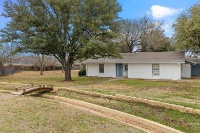 Welcome to 102 Bowie Cove, an exceptional residence nestled on Lake Kiowa Golf Course in Texas - for sale on GolfHomes.com, golf home, golf lot