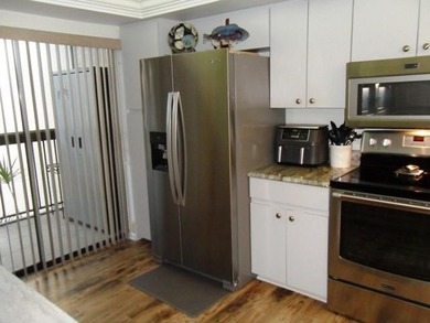 On the Golf course, spacious Turn Key two bed two bath condo on Meadowood Golf and Tennis Club in Florida - for sale on GolfHomes.com, golf home, golf lot