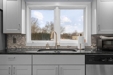 This gorgeous California Split Level home, designed and lived in on Lawrence Country Club in Kansas - for sale on GolfHomes.com, golf home, golf lot