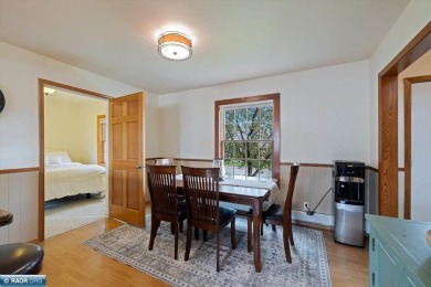 This beautifully maintained 4-bedroom, 3-bathroom home is on Virginia Golf Course in Minnesota - for sale on GolfHomes.com, golf home, golf lot