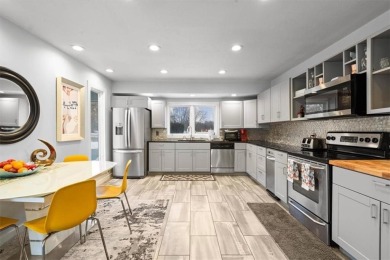 This gorgeous California Split Level home, designed and lived in on Lawrence Country Club in Kansas - for sale on GolfHomes.com, golf home, golf lot