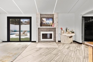 This gorgeous California Split Level home, designed and lived in on Lawrence Country Club in Kansas - for sale on GolfHomes.com, golf home, golf lot
