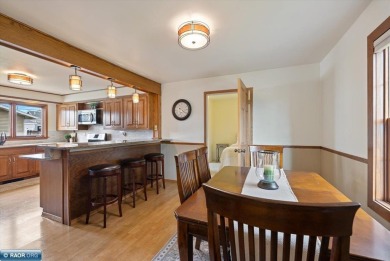This beautifully maintained 4-bedroom, 3-bathroom home is on Virginia Golf Course in Minnesota - for sale on GolfHomes.com, golf home, golf lot