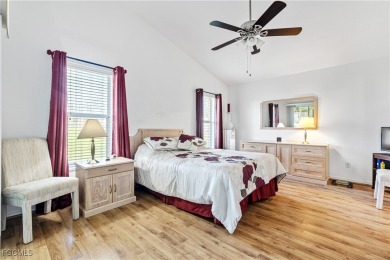 Exceptional Kingston model home with golf course views and on Sabal Springs Golf and Racquet Club in Florida - for sale on GolfHomes.com, golf home, golf lot