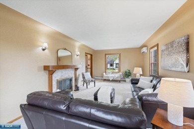 This beautifully maintained 4-bedroom, 3-bathroom home is on Virginia Golf Course in Minnesota - for sale on GolfHomes.com, golf home, golf lot