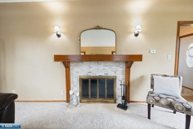 This beautifully maintained 4-bedroom, 3-bathroom home is on Virginia Golf Course in Minnesota - for sale on GolfHomes.com, golf home, golf lot