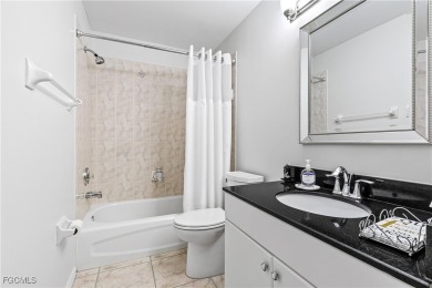 Exceptional Kingston model home with golf course views and on Sabal Springs Golf and Racquet Club in Florida - for sale on GolfHomes.com, golf home, golf lot