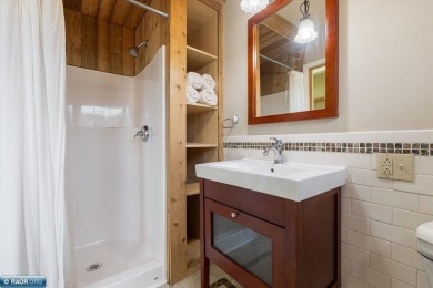 This beautifully maintained 4-bedroom, 3-bathroom home is on Virginia Golf Course in Minnesota - for sale on GolfHomes.com, golf home, golf lot
