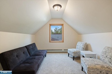This beautifully maintained 4-bedroom, 3-bathroom home is on Virginia Golf Course in Minnesota - for sale on GolfHomes.com, golf home, golf lot