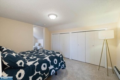 This beautifully maintained 4-bedroom, 3-bathroom home is on Virginia Golf Course in Minnesota - for sale on GolfHomes.com, golf home, golf lot