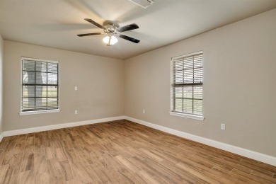 Welcome to 102 Bowie Cove, an exceptional residence nestled on Lake Kiowa Golf Course in Texas - for sale on GolfHomes.com, golf home, golf lot