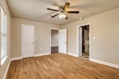 Welcome to 102 Bowie Cove, an exceptional residence nestled on Lake Kiowa Golf Course in Texas - for sale on GolfHomes.com, golf home, golf lot