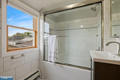 This beautifully maintained 4-bedroom, 3-bathroom home is on Virginia Golf Course in Minnesota - for sale on GolfHomes.com, golf home, golf lot