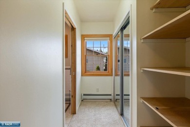 This beautifully maintained 4-bedroom, 3-bathroom home is on Virginia Golf Course in Minnesota - for sale on GolfHomes.com, golf home, golf lot