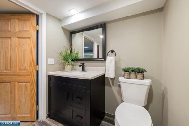 This beautifully maintained 4-bedroom, 3-bathroom home is on Virginia Golf Course in Minnesota - for sale on GolfHomes.com, golf home, golf lot