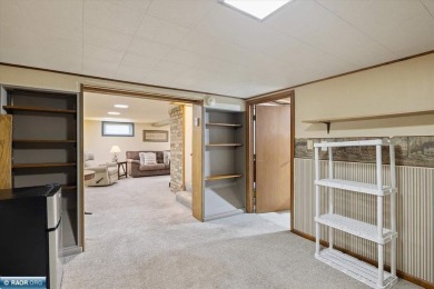 This beautifully maintained 4-bedroom, 3-bathroom home is on Virginia Golf Course in Minnesota - for sale on GolfHomes.com, golf home, golf lot