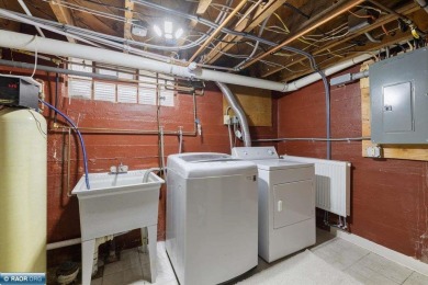 This beautifully maintained 4-bedroom, 3-bathroom home is on Virginia Golf Course in Minnesota - for sale on GolfHomes.com, golf home, golf lot
