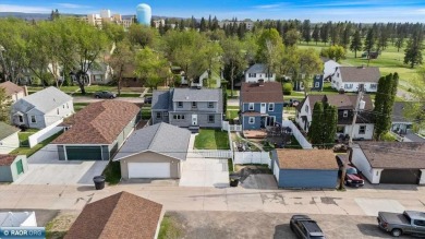 This beautifully maintained 4-bedroom, 3-bathroom home is on Virginia Golf Course in Minnesota - for sale on GolfHomes.com, golf home, golf lot