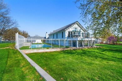This gorgeous California Split Level home, designed and lived in on Lawrence Country Club in Kansas - for sale on GolfHomes.com, golf home, golf lot