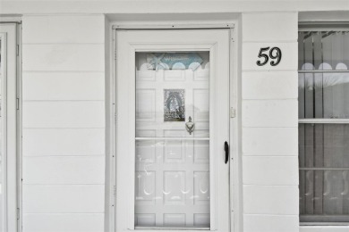 Breezy, bright & Beautiful.  This 3rd-floor condo is the perfect on On Top Of The World Golf Course in Florida - for sale on GolfHomes.com, golf home, golf lot
