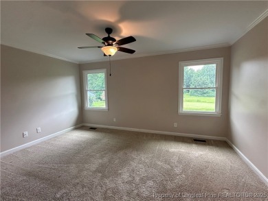 Absolute darling townhome tucked along #12 green @King's Grant on Kings Grant Golf and Country Club in North Carolina - for sale on GolfHomes.com, golf home, golf lot