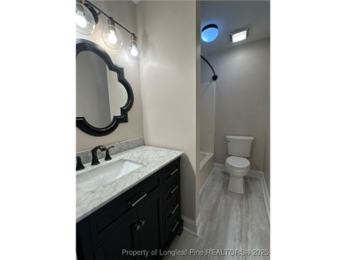 Absolute darling townhome tucked along #12 green @King's Grant on Kings Grant Golf and Country Club in North Carolina - for sale on GolfHomes.com, golf home, golf lot