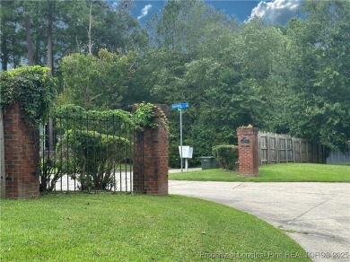 Absolute darling townhome tucked along #12 green @King's Grant on Kings Grant Golf and Country Club in North Carolina - for sale on GolfHomes.com, golf home, golf lot