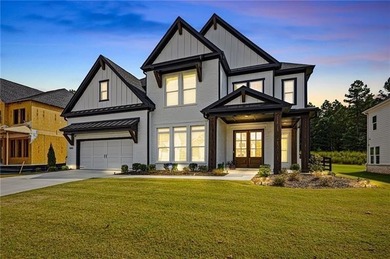 Welcome home to this executive home built by the Toll Brothers on Capital City Club Crabapple in Georgia - for sale on GolfHomes.com, golf home, golf lot