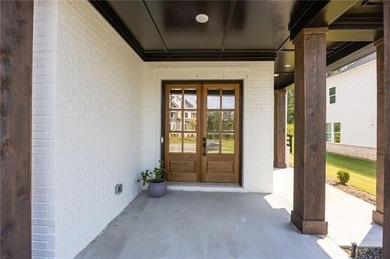 Welcome home to this executive home built by the Toll Brothers on Capital City Club Crabapple in Georgia - for sale on GolfHomes.com, golf home, golf lot