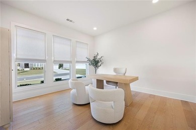 Welcome home to this executive home built by the Toll Brothers on Capital City Club Crabapple in Georgia - for sale on GolfHomes.com, golf home, golf lot