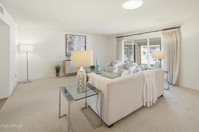 Enter through a charming iron-gated private courtyard that sets on Pebblebrook Golf Course in Arizona - for sale on GolfHomes.com, golf home, golf lot