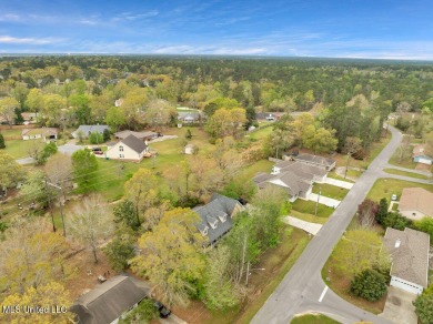 Your search is over! This one owner home was built with love and on Diamondhead Country Club in Mississippi - for sale on GolfHomes.com, golf home, golf lot