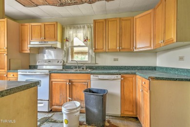 Two properties, one great opportunity! Here's your chance to own on Country Club of Bristol in Tennessee - for sale on GolfHomes.com, golf home, golf lot