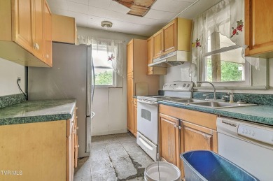 Two properties, one great opportunity! Here's your chance to own on Country Club of Bristol in Tennessee - for sale on GolfHomes.com, golf home, golf lot