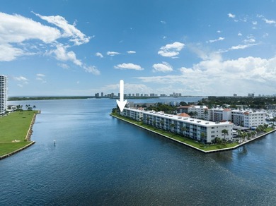 Enjoy the sweeping Intracoastal views in this first floor 2 on North Palm Beach Country Club in Florida - for sale on GolfHomes.com, golf home, golf lot