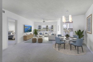 Enjoy the sweeping Intracoastal views in this first floor 2 on North Palm Beach Country Club in Florida - for sale on GolfHomes.com, golf home, golf lot