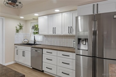 Carefree Living with Golf Course Views - Ground-Level End Unit! on Sugarmill Woods Golf and Country Club in Florida - for sale on GolfHomes.com, golf home, golf lot