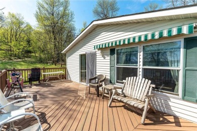 Enjoy lakeside living at its finest on beautiful Stalker Lake in on Stalker Lake Golf Course in Minnesota - for sale on GolfHomes.com, golf home, golf lot