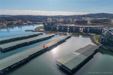 Top floor 2-bedroom loft unit spanning over 1400sqft and even on Lake Valley Country Club in Missouri - for sale on GolfHomes.com, golf home, golf lot