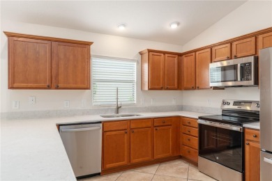 BRAND NEW ROOF JUNE 2025 ON THIS BEAUTIFULLY UPDATED 3 BED / 2 on The Links of Spruce Creek in Florida - for sale on GolfHomes.com, golf home, golf lot
